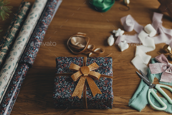 Merry Christmas! Wrapping christmas present Stock Photo by Sonyachny