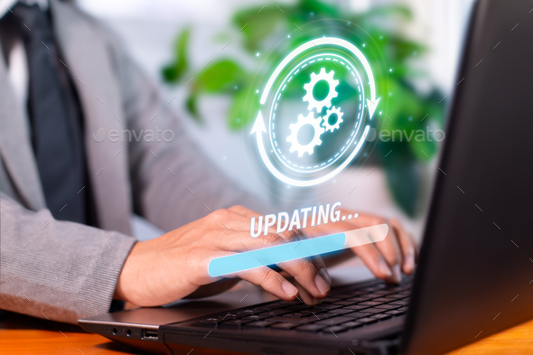 Staying Current: System and Software Updates for Enhanced Functionality and Security - Stock Photo - Images