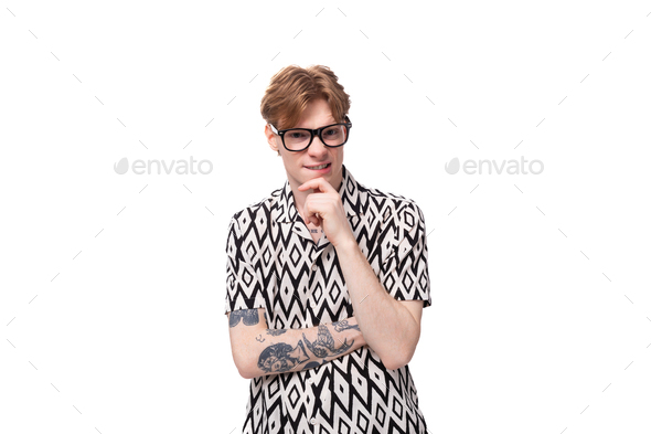 A man with glasses and a red and black shirt photo – Man Image on