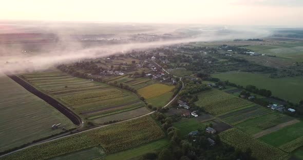 Sunrise and Morning Fog Over the Countryside alt