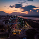 Beautiful sunset over the city with a lighted Ferris wheel. - PhotoDune Item for Sale