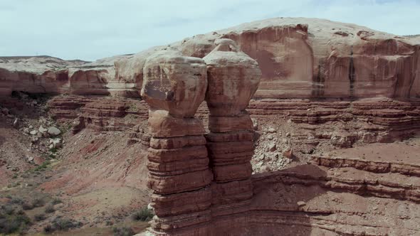 Beautiful scenic aerial view of Navajo Twins red rock formation landmark in Bluff, Utah, USA alt
