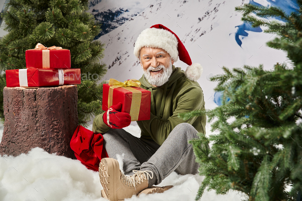 Amazed white grey hair santa claus switch channel remote control hold  soccer ball have christmas evergreen tree fireplace x-mas decor isolated  shine Stock Photo - Alamy