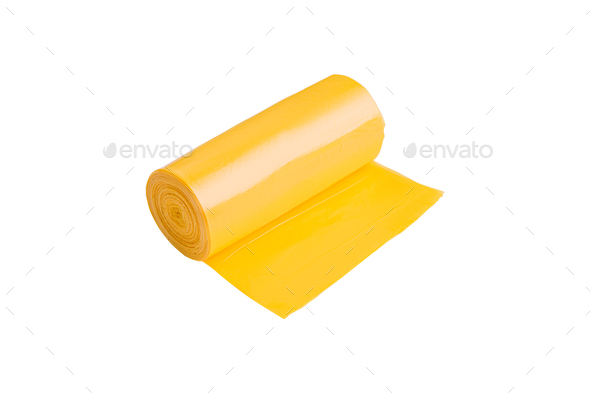 Rolls Of Yellow Trash Bags On White Background Stock Photo