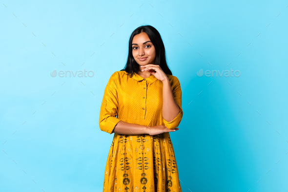 Premium PSD | Young business indian woman showing back, posing and waiting,  looking back