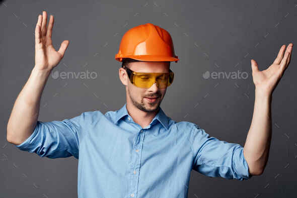 Construction Worker with Hard Hat and Safety Goggles, Photograph