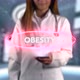 Female Doctor Hologram Word Illness Obesity - VideoHive Item for Sale
