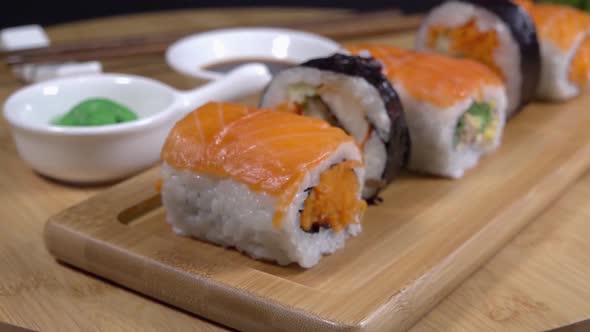 Dolly To Fresh Sushi on a Bamboo Board alt