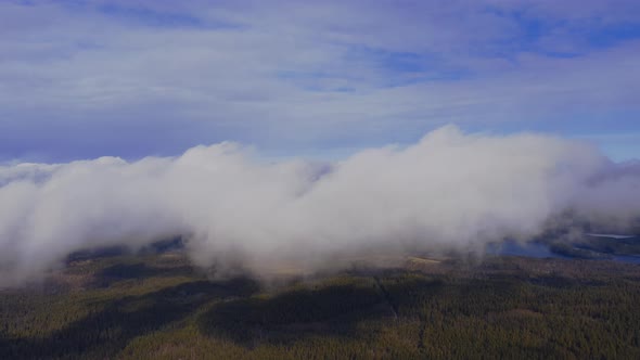 Aerial clouds flying sky in motion. Aerial view white clouds in blue sky 
