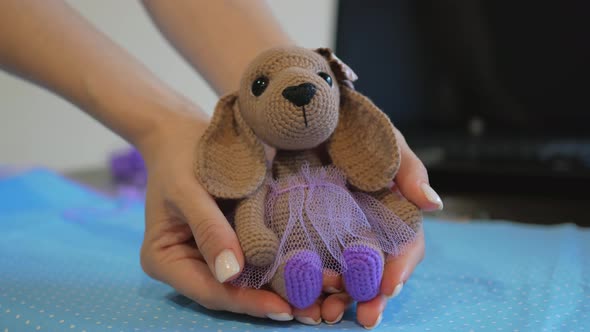 Women's Hands Hold Crochet Toy Their Palms Beautiful Bow Ear Purple Dress alt