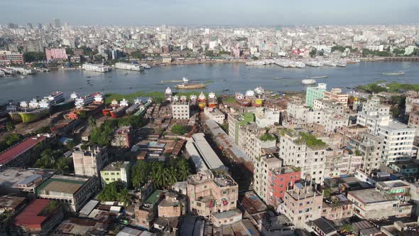 Birds eye view of populated and historic city of Dhaka, around Buriganga river. alt