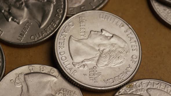 Rotating stock footage shot of American quarters (coin - $0.25) - MONEY 0233 alt
