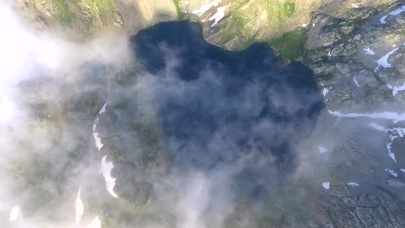 Crater Lake Under the Clouds alt
