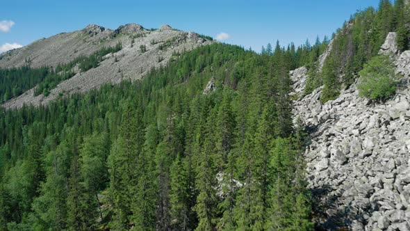 Aerial View of Suka Mountain Range in Ural, Drone Flies Near Stones and Boulders