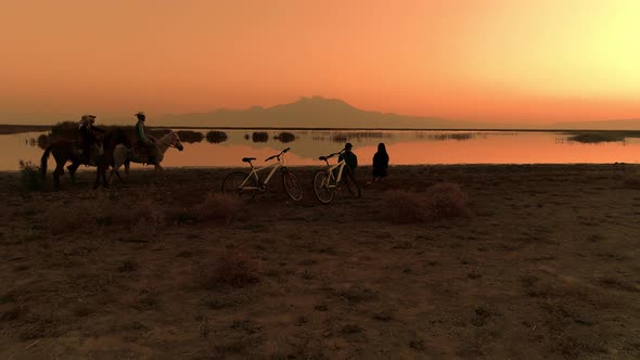 Cowboys With Horses and Friends at Sunrise alt