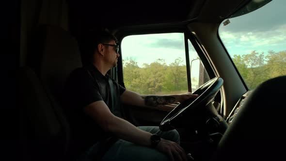 Truck Driver Rides to Destination Cargo alt