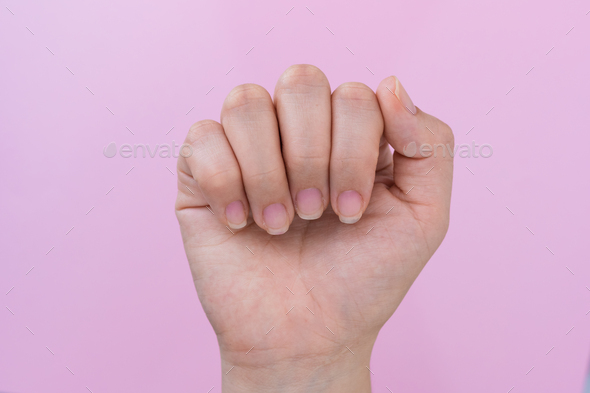 Premium Vector | The contour of female hands. pink textured background. hands  in different poses.