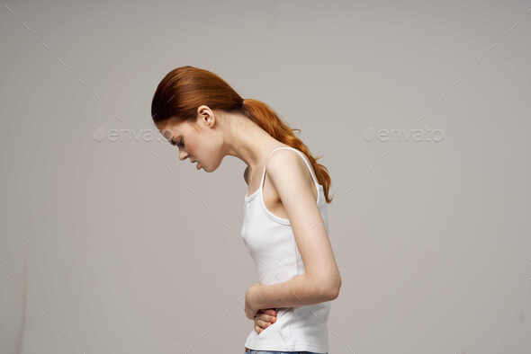 woman groin pain intimate illness gynecology discomfort light background  Stock Photo by shotprime
