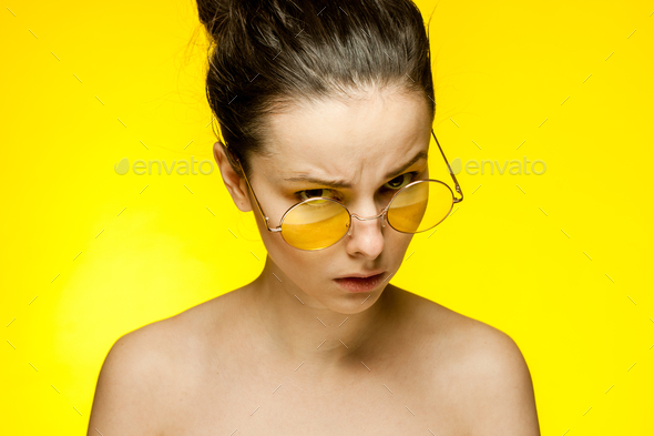 pretty brunette naked shoulders glasses emotions attractive look Stock Photo by shotprime