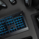 Blue lit keyboard by various wireless gadgets - PhotoDune Item for Sale