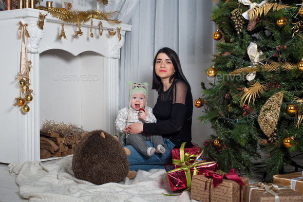 Cheerful Mother and Son with Christmas Gifts Stock Photo - Image