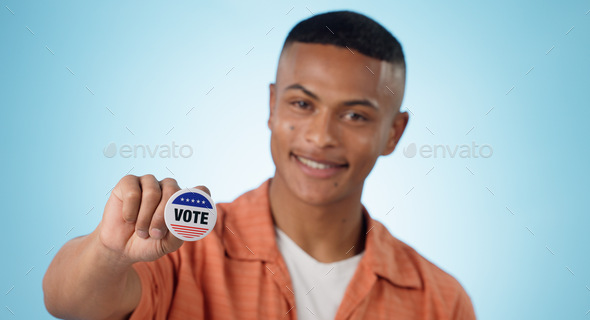Man, vote sticker and smile for election, positive and politics for america, government and studio