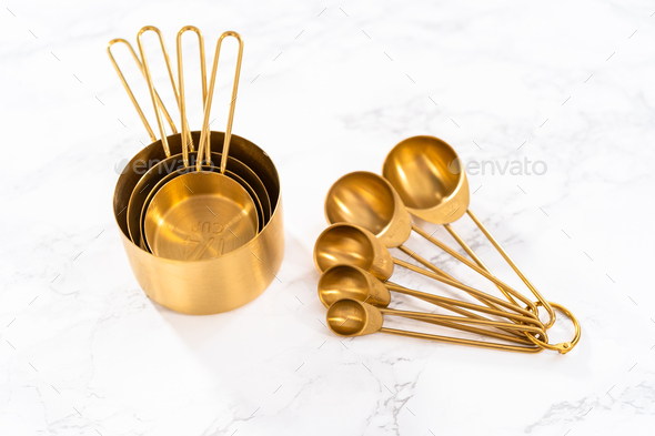 Measuring cups and spoons Stock Photo by arina-habich