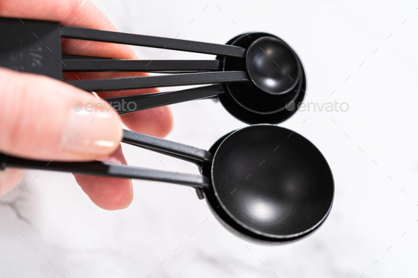 Measuring cups and spoons Stock Photo by arina-habich