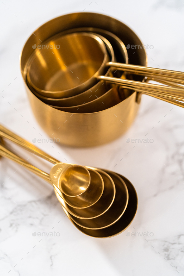 Measuring cups and spoons Stock Photo by arina-habich