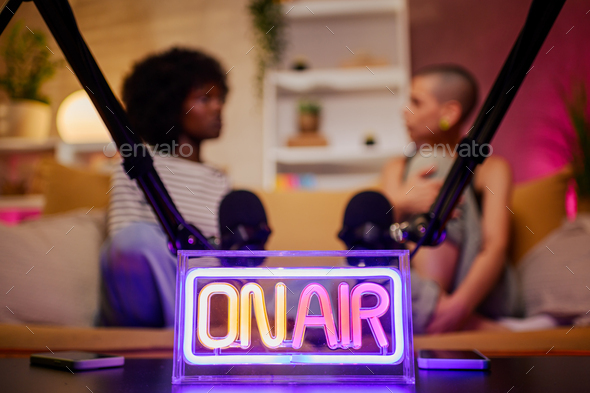 Close shot of a neon on air sign in a recording studio