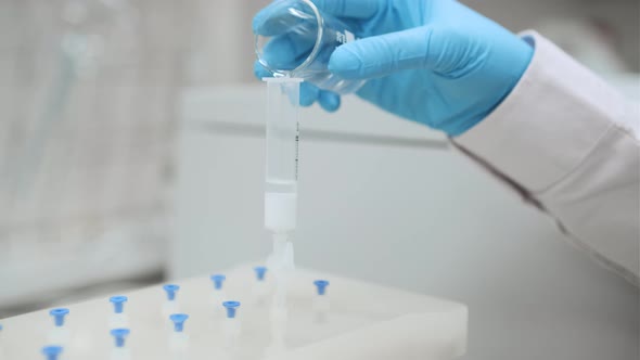 Scientist Actives Cartridge in SPE Manifold with a Solvent alt