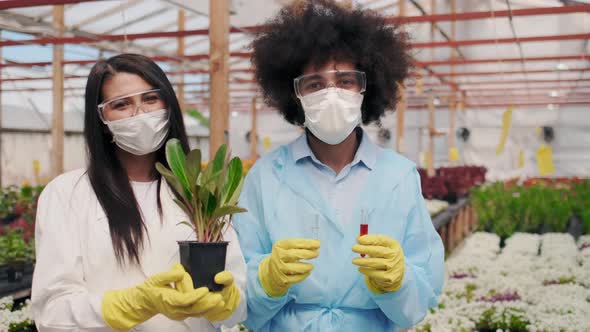 Portrait of Confident and Succesful Biologist or Scientist After Science DNA Research alt