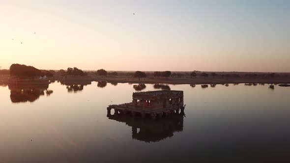 Aerial view 4k video by drone of Shrines And Temples At Gad sisar Lake alt