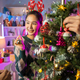 Group of Asian friends Decorating the christmas tree at home. - PhotoDune Item for Sale