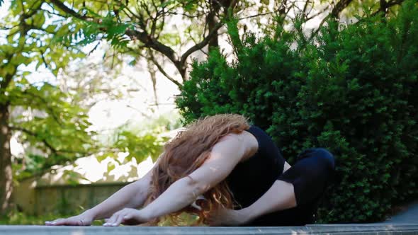 Woman Doing Bearhing Exercise Outdoors alt