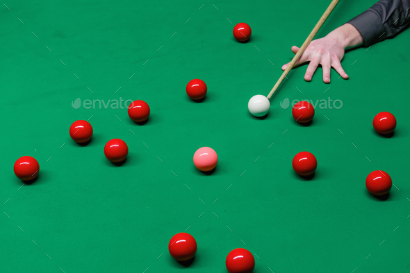 Snooker pool table with colorful balls, setting the stage for an exciting cue sports match