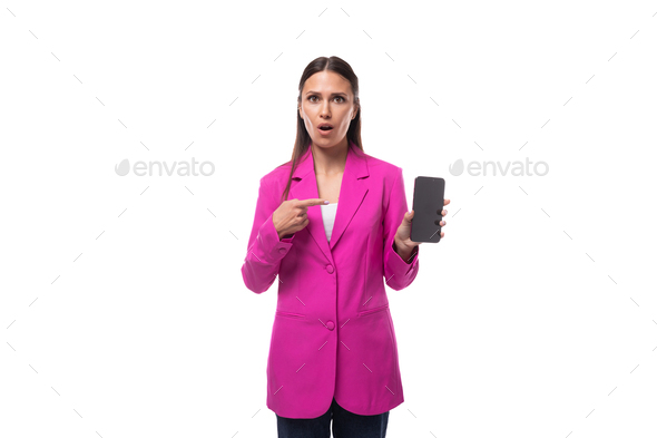 young slim brunette secretary woman wearing lilac jacket holding smartphone with mockup