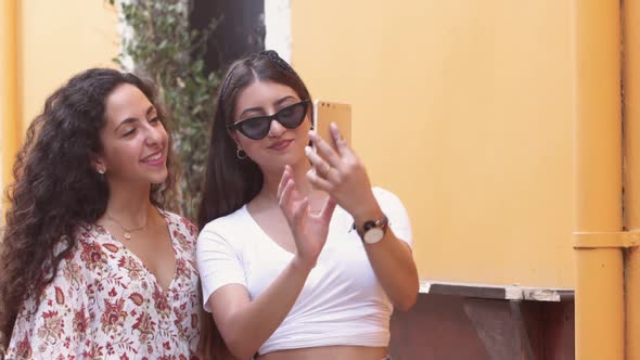 Young Multiethnic Women Smiling and Taking Selfie for Social Media