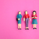 three female miniatures in different clothes. business partner concept.  - PhotoDune Item for Sale