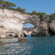 view from the boat of the famous rock caves of the Gargano coast - PhotoDune Item for Sale