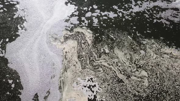 The Flow of Dirty Sewage and Chemical Waste From the City