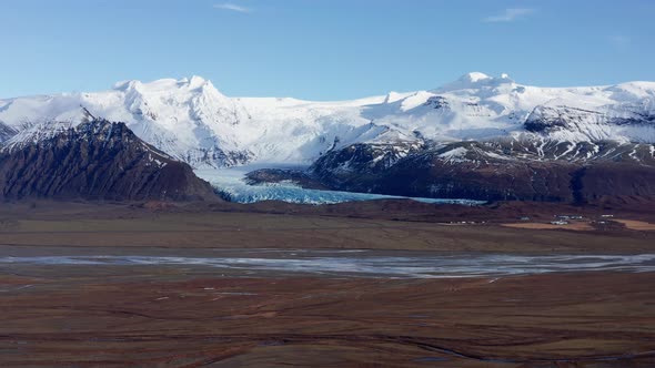 Aerial Wide View of a Majestic Snow Capped Mountains in Iceland alt