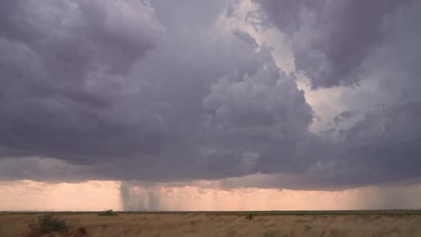 View of rainstorm in West Texas from vehicle while storm chasing alt