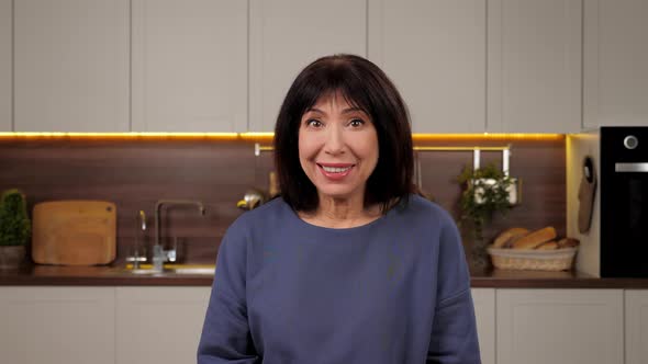 Smiling Aged Woman Greets Talking Listens Online Video Call Webcam View Laptop alt