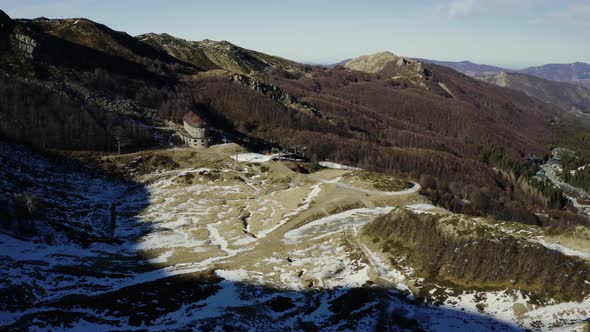 Aerial, Alps Mountains Partially Covered With Snow In Italy