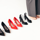 Woman choosing suitable shoes for evening or office. - PhotoDune Item for Sale