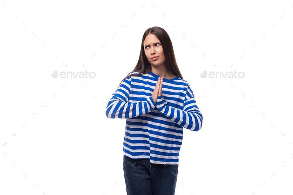 pretty slender brunette with straight hair is dressed in blue striped sailor clothes