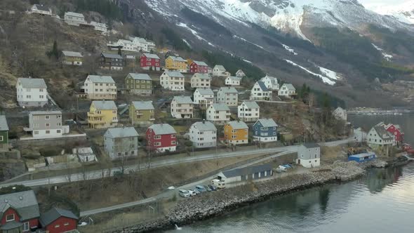Aerial View Flying Towards the Colorful Houses in the Small Town of Odda, Norway Located Right Next alt