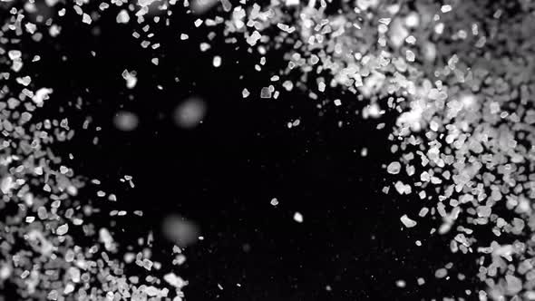 Super Slow Motion Shot of Salt Explosion on Black Background at 1000Fps alt