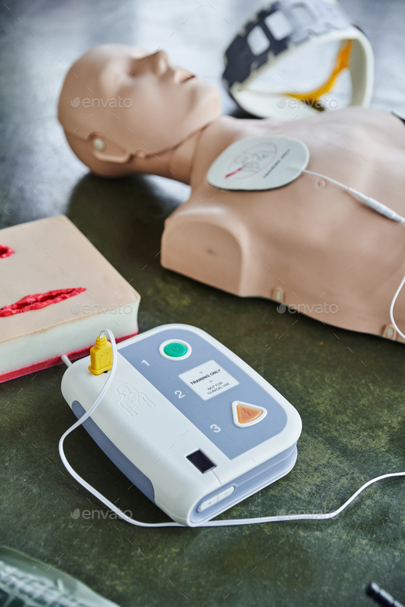 automated external defibrillator near wound care simulator, CPR manikin ...